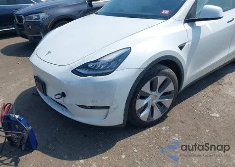 2023 Tesla Model Y Awd/Long Range Dual Motor All-Wheel Drive z USA, uszkodzony, nr VIN 7SAYGDEE5PA126165